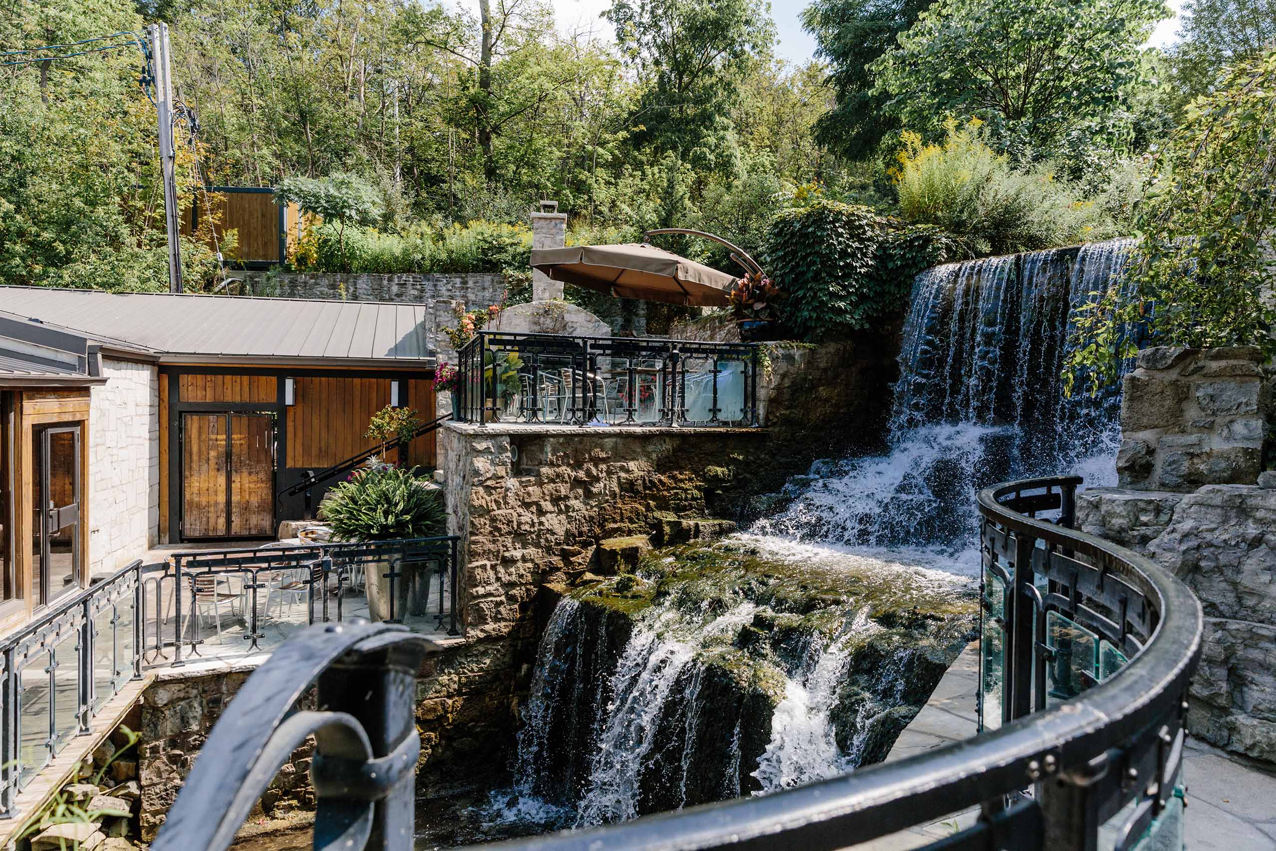 Exterior patio next to the waterfall at Ancaster Mill